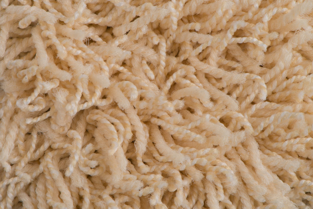 Close Up of Beige Wool Carpet Fibers for Types of Commercial Carpet Fibers Blog